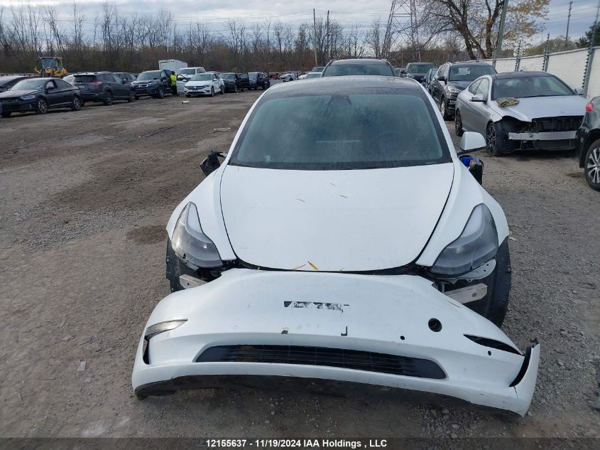 2021 Tesla Model 3 VIN: 5YJ3E1EA1MF057983 Lot: 12155637