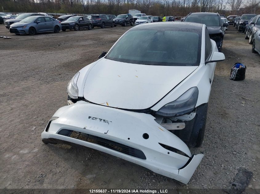 2021 Tesla Model 3 VIN: 5YJ3E1EA1MF057983 Lot: 12155637