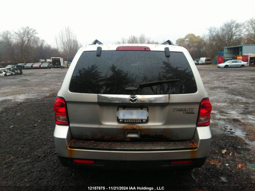 2010 Mazda Tribute I VIN: 4F2CY0C75AKM04643 Lot: 12157875