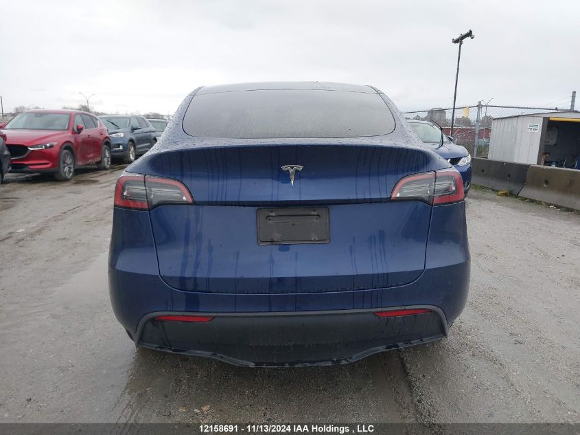 2023 Tesla Model Y VIN: LRWYGDFD6PC966794 Lot: 12158691