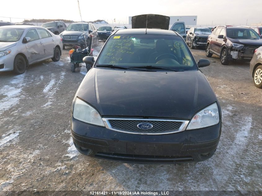 2005 Ford Focus VIN: 3FAFP37N65R154184 Lot: 12161421