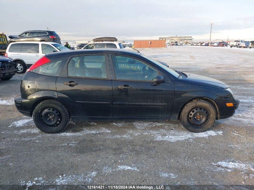 2005 Ford Focus VIN: 3FAFP37N65R154184 Lot: 12161421