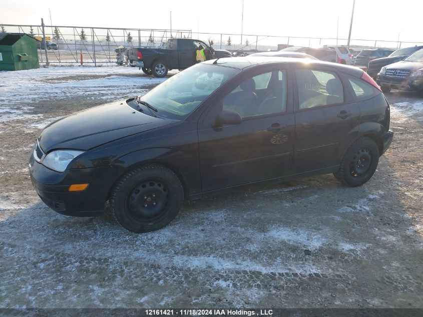 2005 Ford Focus VIN: 3FAFP37N65R154184 Lot: 12161421