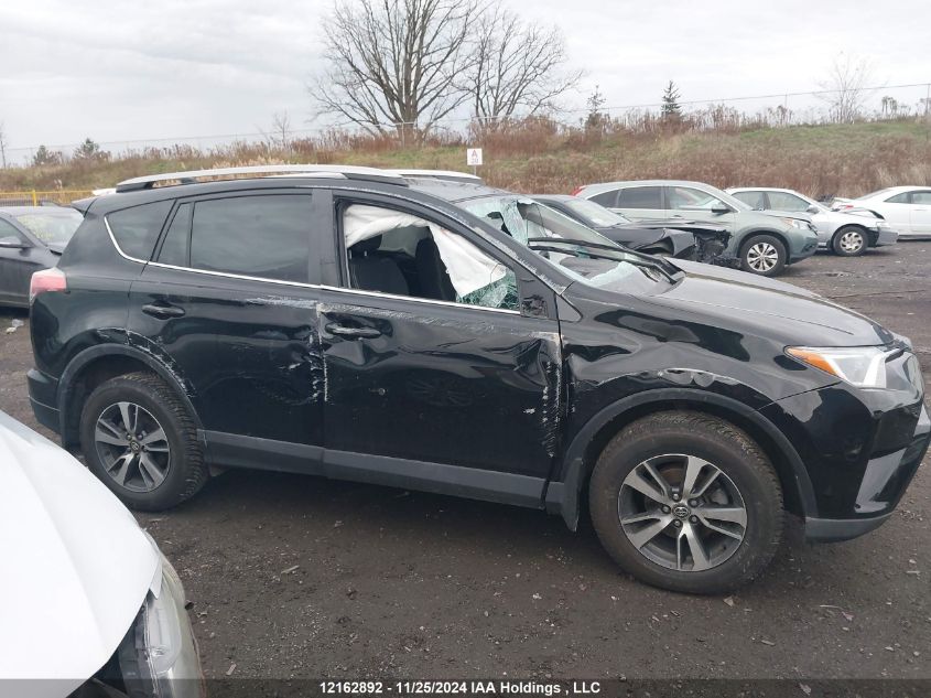 2018 Toyota Rav4 VIN: 2T3RFREV3JW748950 Lot: 12162892