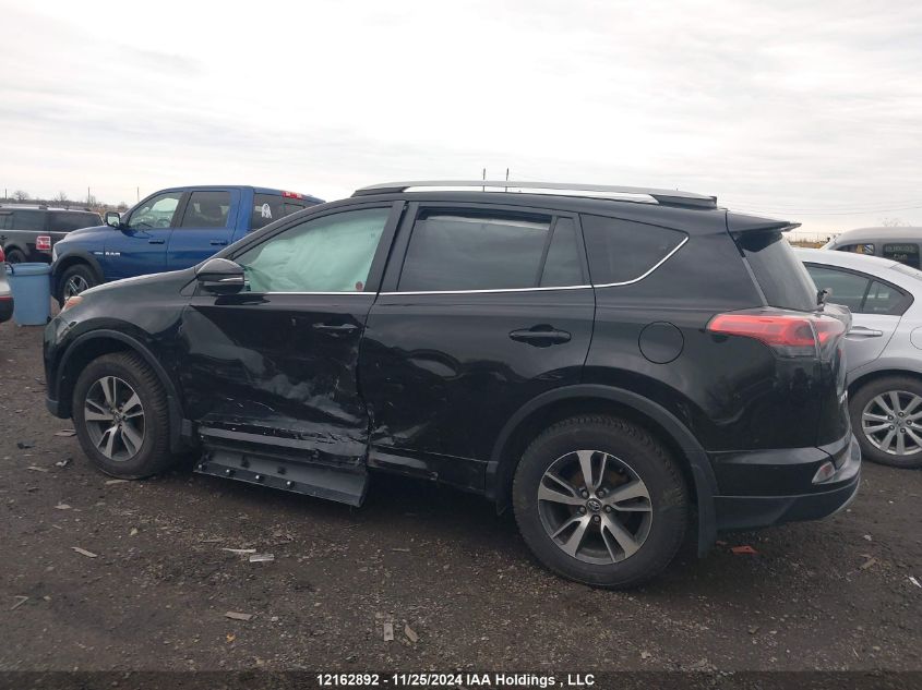 2018 Toyota Rav4 VIN: 2T3RFREV3JW748950 Lot: 12162892