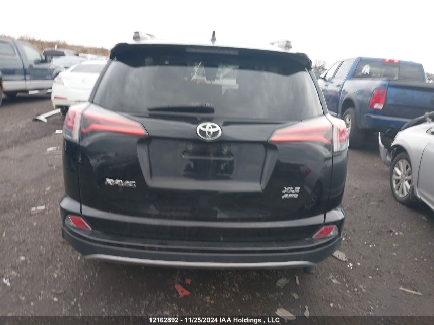 2018 Toyota Rav4 VIN: 2T3RFREV3JW748950 Lot: 12162892