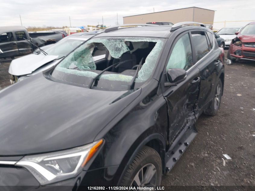 2018 Toyota Rav4 VIN: 2T3RFREV3JW748950 Lot: 12162892