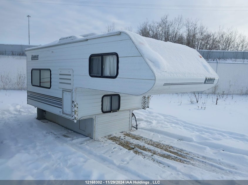 157246XXXXXXXXXXX 2004 Lance Camper auction photo 1