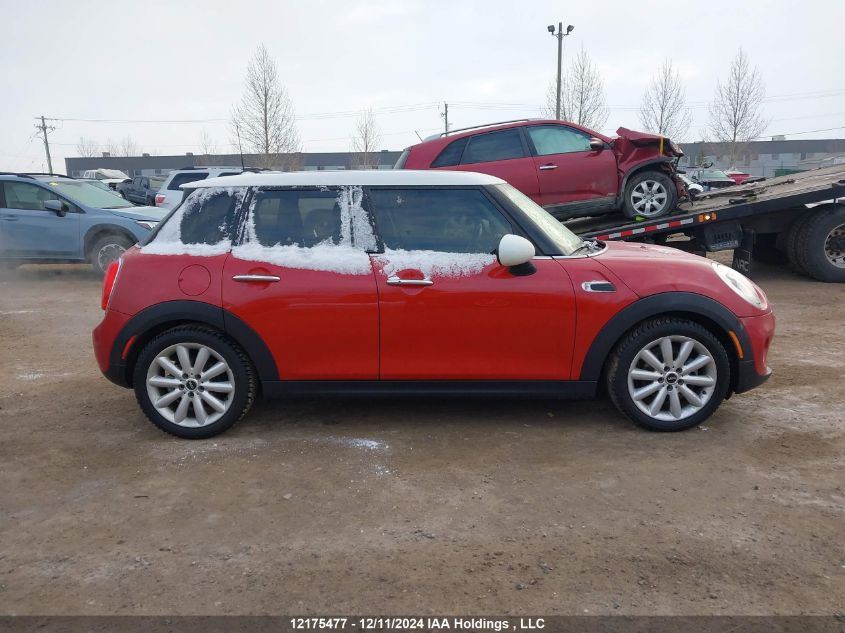 2016 Mini Cooper Hardtop 5 Door VIN: WMWXU1C58G2D09357 Lot: 12175477