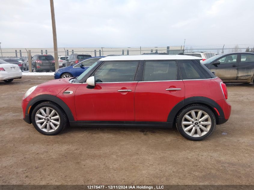 2016 Mini Cooper Hardtop 5 Door VIN: WMWXU1C58G2D09357 Lot: 12175477