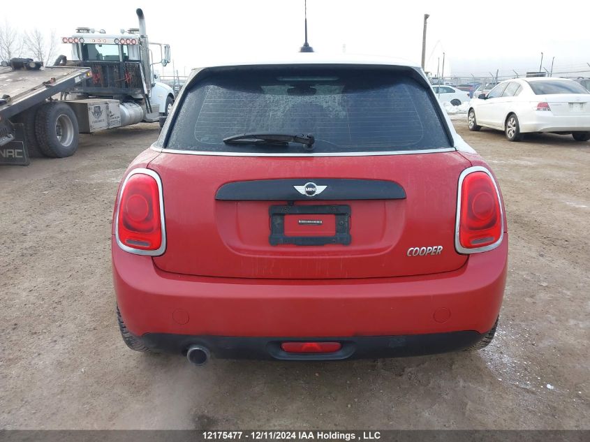 2016 Mini Cooper Hardtop 5 Door VIN: WMWXU1C58G2D09357 Lot: 12175477