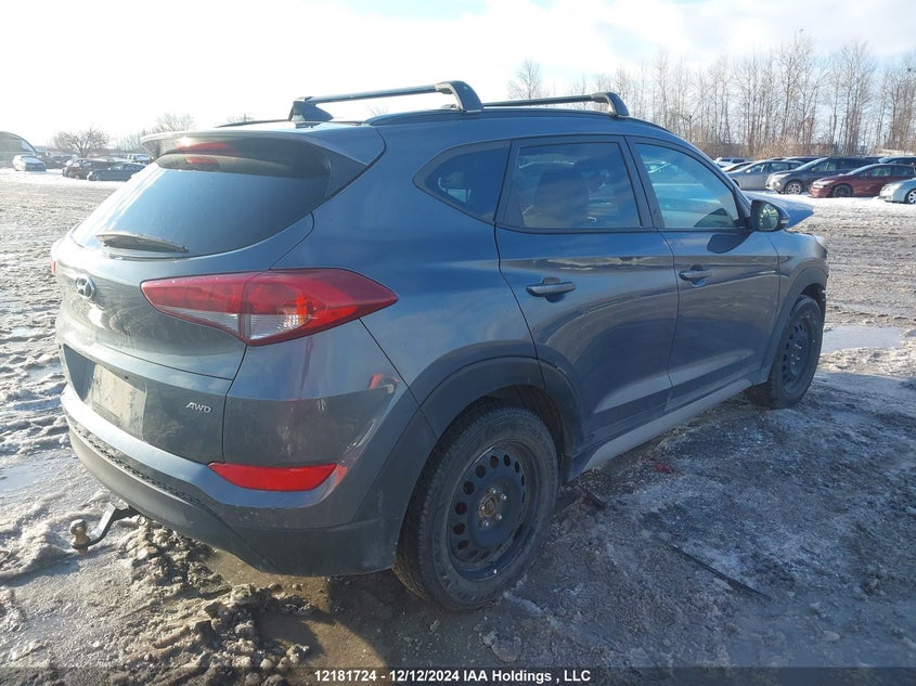 KM8J3CA42JU766400 2018 HYUNDAI TUCSON photo no. 4