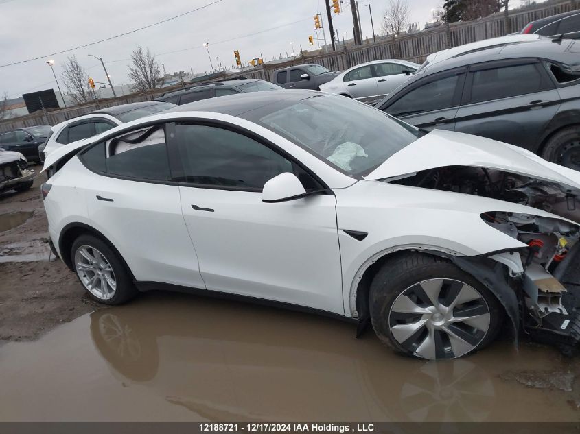 2022 Tesla Model Y VIN: 7SAYGDEE0NF358558 Lot: 12188721