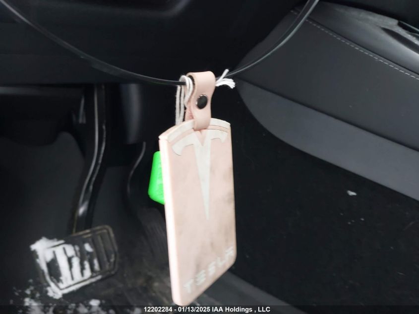 2024 Tesla Model Y Long Range VIN: 7SAYGDEE8RF991153 Lot: 12202284