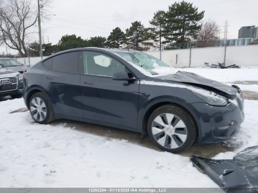 2024 Tesla Model Y Long Range VIN: 7SAYGDEE8RF991153 Lot: 12202284