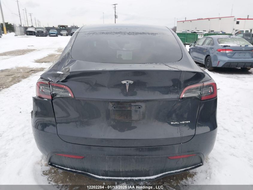 2024 Tesla Model Y Long Range VIN: 7SAYGDEE8RF991153 Lot: 12202284
