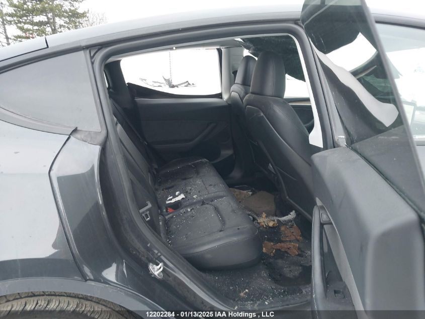 2024 Tesla Model Y Long Range VIN: 7SAYGDEE8RF991153 Lot: 12202284