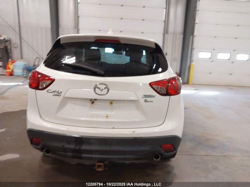 2014 Mazda Cx-5 Touring VIN: JM3KE4CY4E0339037 Lot: 12205794