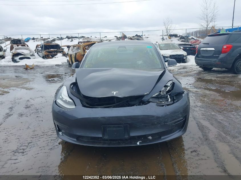 2019 Tesla Model 3 VIN: 5YJ3E1EB6KF414872 Lot: 12242352