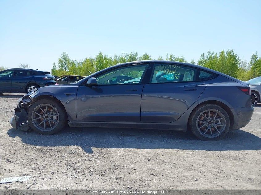 2022 Tesla Model 3 VIN: 5YJ3E1EA9NF355117 Lot: 12295982