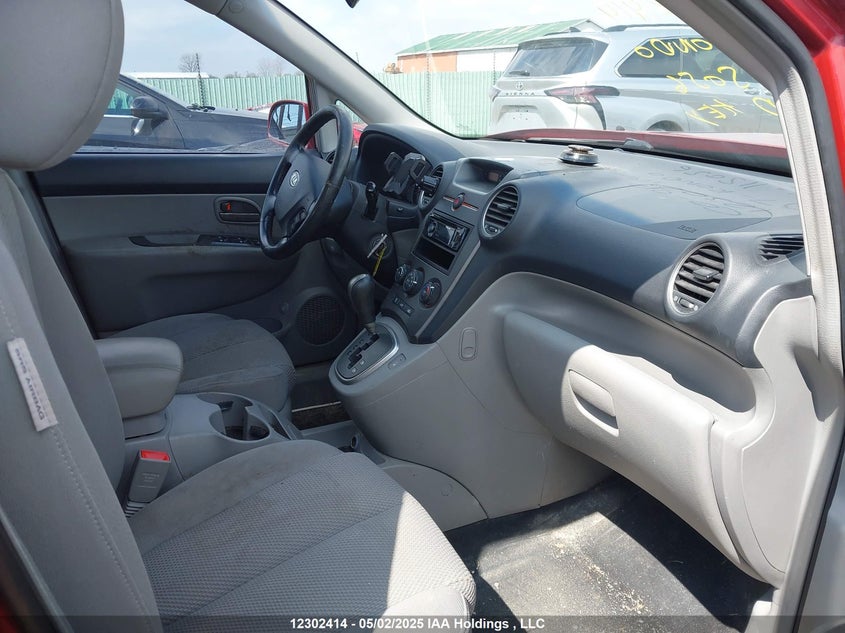 2007 Kia Rondo Lx/Ex VIN: KNAFG526477115056 Lot: 12302414