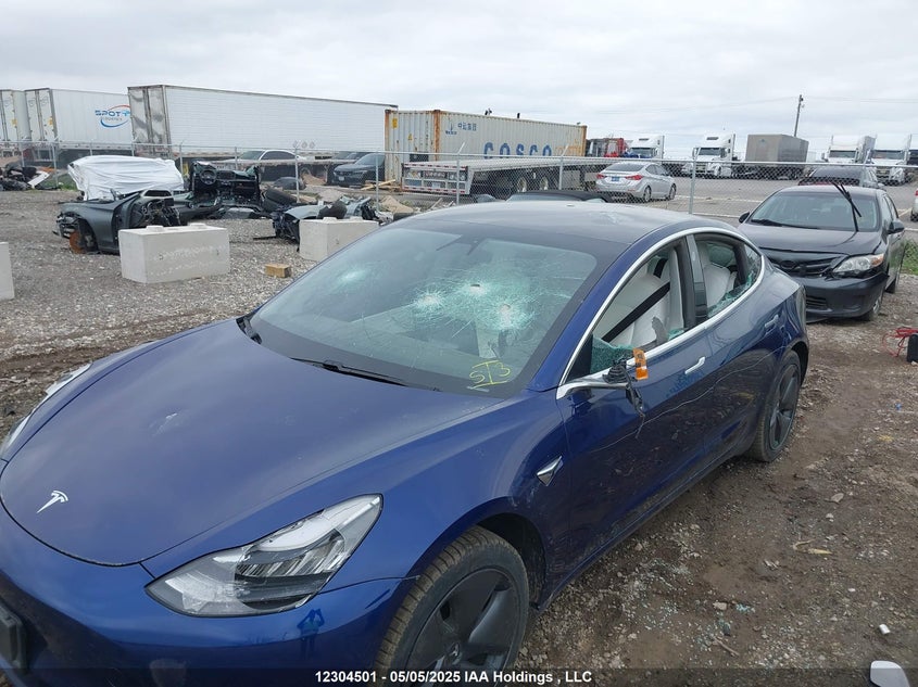 2020 Tesla Model 3 VIN: 5YJ3E1EA2LF604063 Lot: 12304501