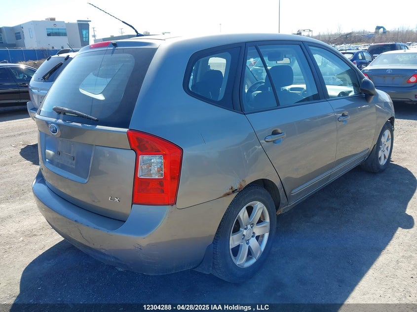 2009 Kia Rondo Ex/Ex-Premium/Lx VIN: KNAFG528597257713 Lot: 12304288X