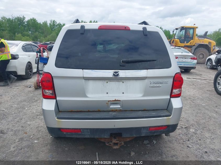 2010 Mazda Tribute S VIN: 4F2CY9GG8AKM05218 Lot: 12316641