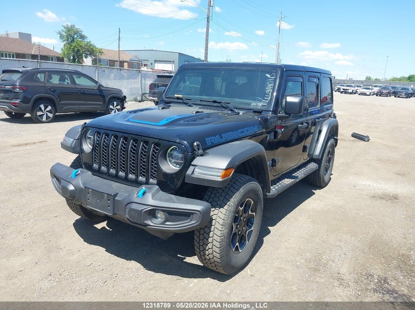 2022 Jeep Wrangler Unlimited Rubicon 4Xe, Left Side, IAAI, VIN 1C4JJXR62NW211206 — photo 2