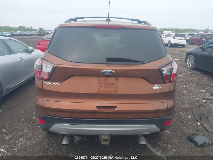2017 Ford Escape Se VIN: 1FMCU9G91HUB16642 Lot: 12324870