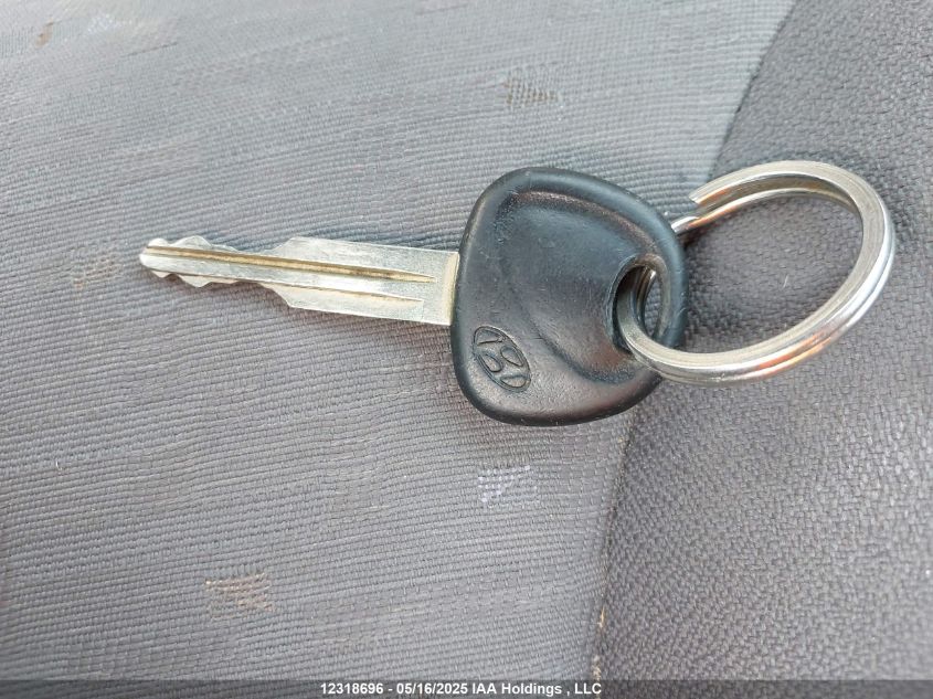 2005 Hyundai Accent Gs/Gsi VIN: KMHCG35C35U348884 Lot: 12318696X