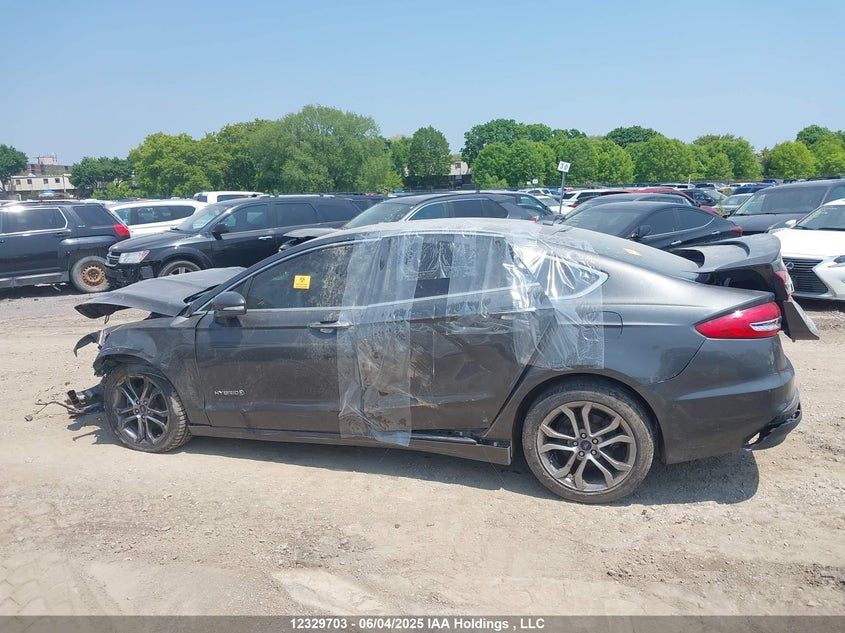 2019 Ford Fusion Hybrid Titanium VIN: 3FA6P0RU2KR211642 Lot: 12329703