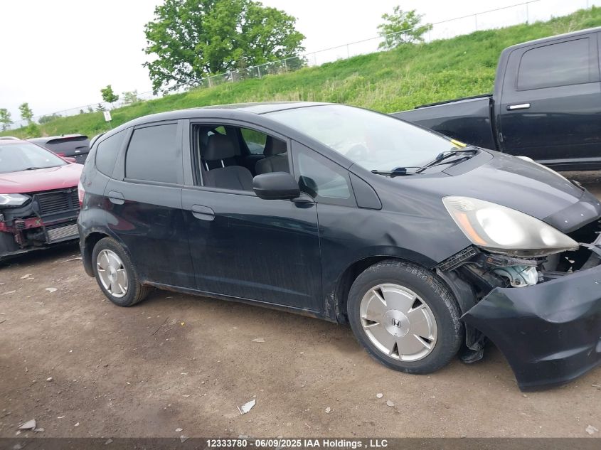 2009 Honda Fit Lx VIN: JHMGE885X9S801632 Lot: 12333780