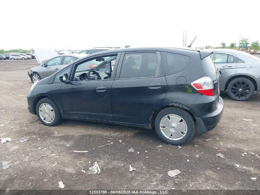 2009 Honda Fit Lx VIN: JHMGE885X9S801632 Lot: 12333780