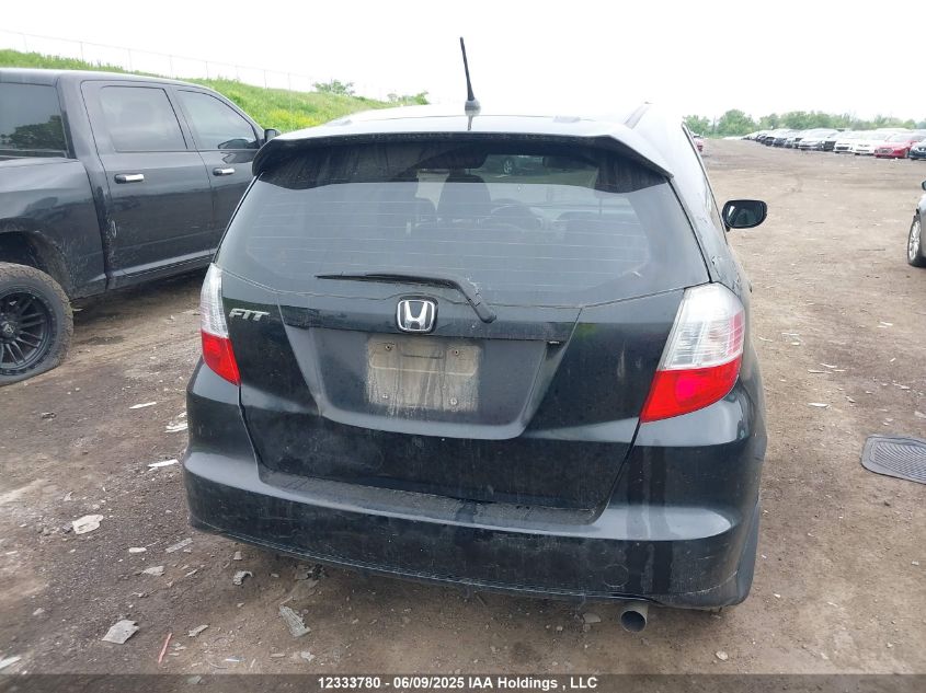 2009 Honda Fit Lx VIN: JHMGE885X9S801632 Lot: 12333780