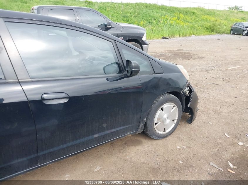 2009 Honda Fit Lx VIN: JHMGE885X9S801632 Lot: 12333780