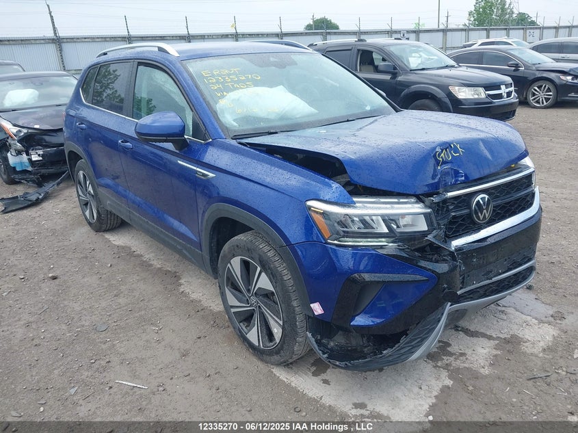 3VVUX7B2XRM095585 VOLKSWAGEN TAOS Photo 1