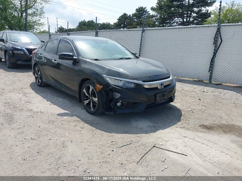 2018 Honda Civic Touring VIN: 2HGFC1F97JH107610 Lot: 12341415