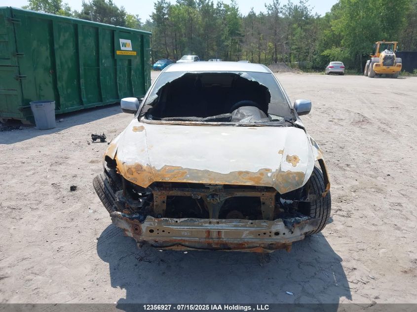 2014 Subaru Impreza 2.0I Touring Package VIN: JF1GPAC67E9218560 Lot: 12356927