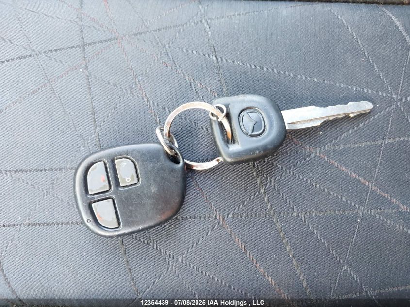 2011 Mazda Mazda2 Gs/Gx VIN: JM1DE1HY2B0125250 Lot: 12354439X