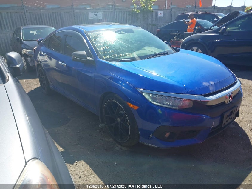 2HGFC1F95HH104182 2017 Honda Civic Touring auction photo 1