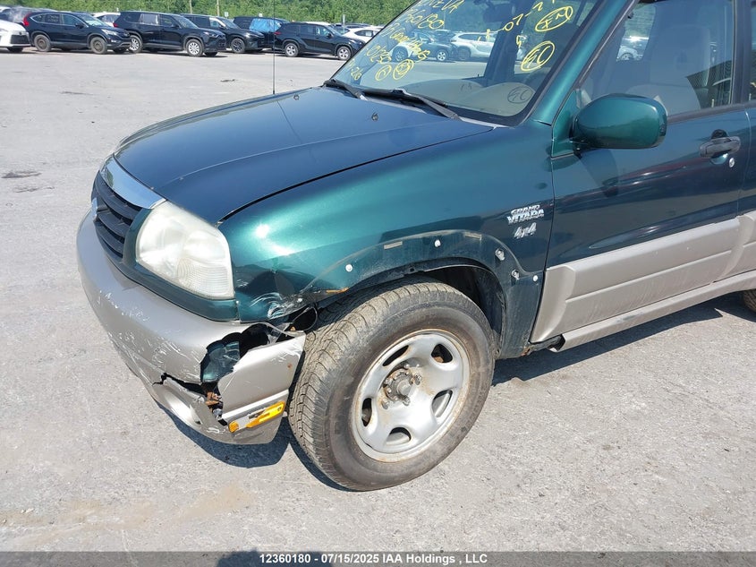 2003 Suzuki Grand Vitara Jlx/Jx VIN: JS3TD62V034101230 Lot: 12360180X