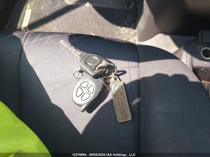 2011 Mazda Mazda2 VIN: JM1DE1HY7B0118861 Lot: 12376694