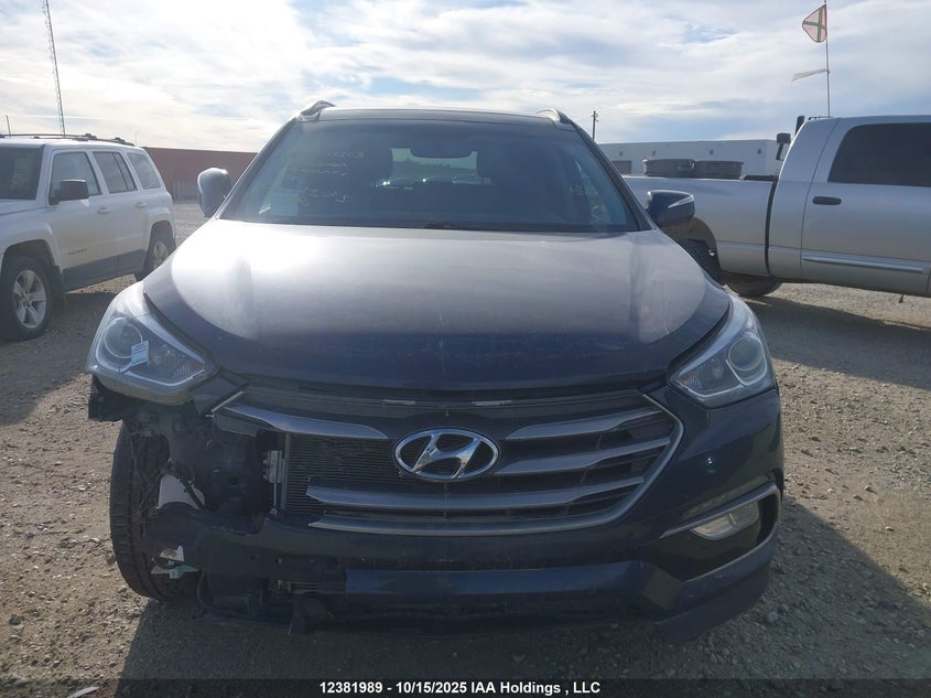 5NMZUDLA8JH055093 2018 HYUNDAI SANTA FE photo no. 12