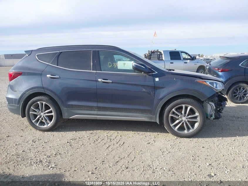 5NMZUDLA8JH055093 2018 HYUNDAI SANTA FE photo no. 13