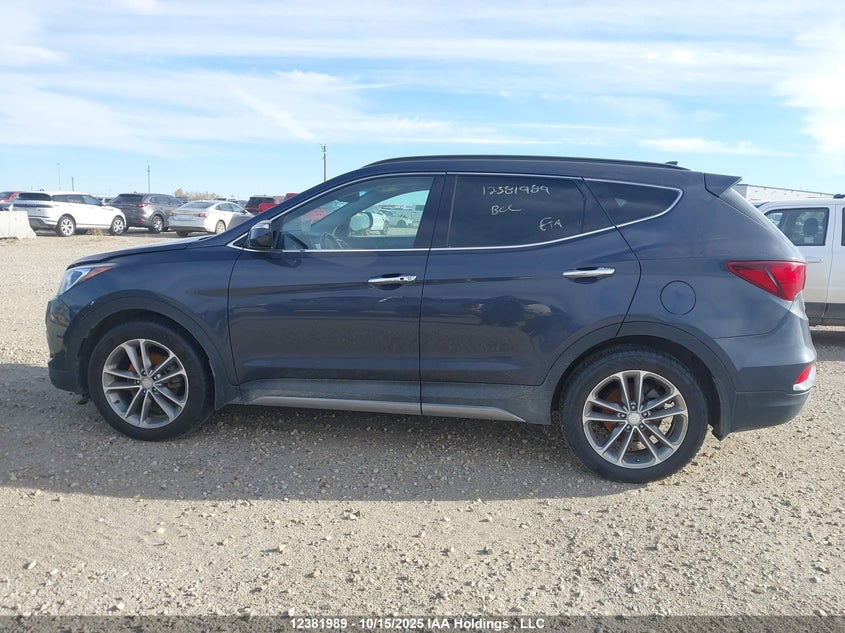 5NMZUDLA8JH055093 2018 HYUNDAI SANTA FE photo no. 14