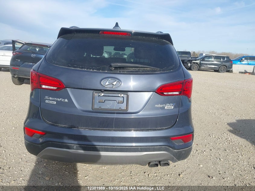 5NMZUDLA8JH055093 2018 HYUNDAI SANTA FE photo no. 16