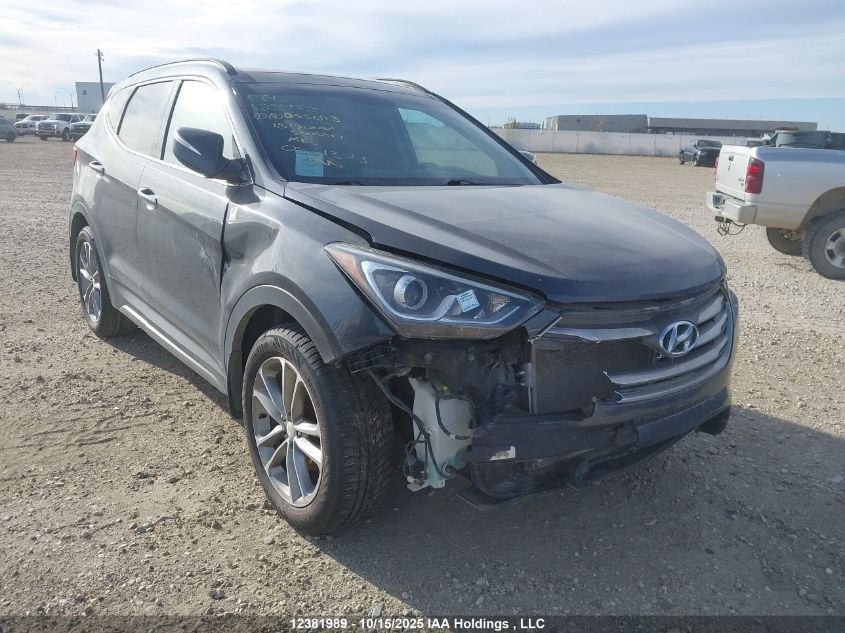 5NMZUDLA8JH055093 HYUNDAI SANTA FE Photo 1