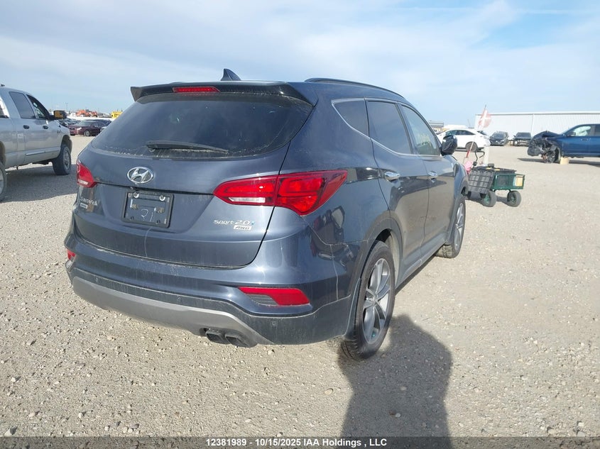 5NMZUDLA8JH055093 2018 HYUNDAI SANTA FE photo no. 4