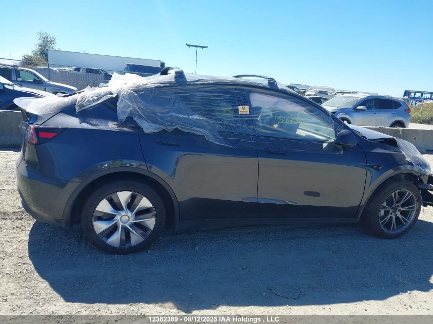 2024 Tesla Model Y Long Range VIN: 7SAYGDEE9RF989878 Lot: 12382389